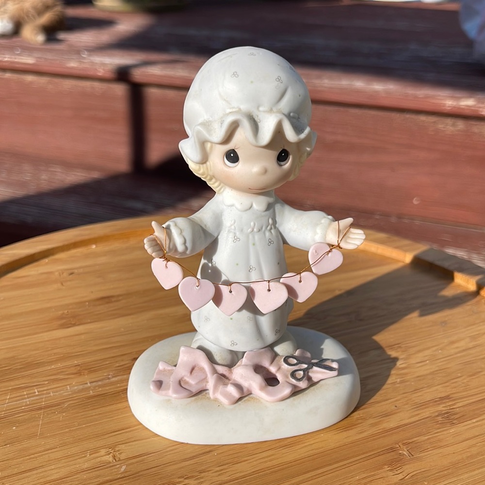 Precious Moments Figurine "You Have Touched So Many Hearts"